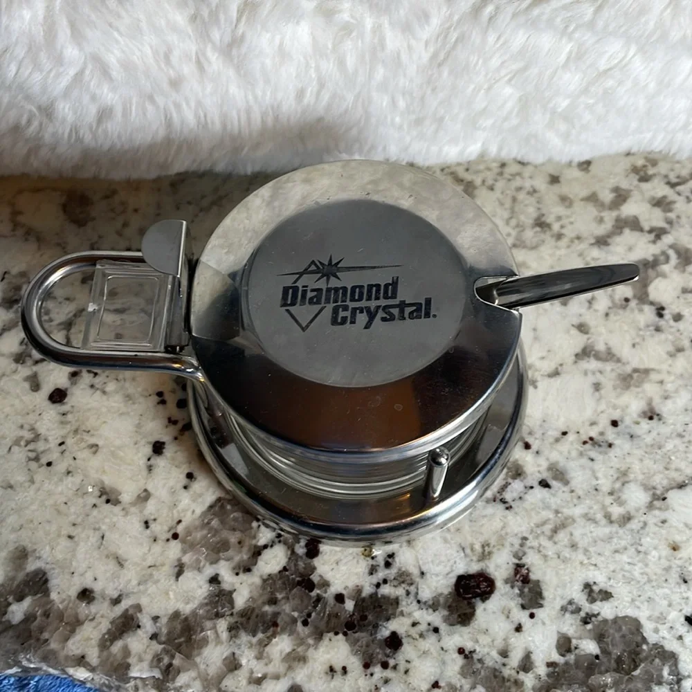 Vintage Parmesan cheese dish with spoon
